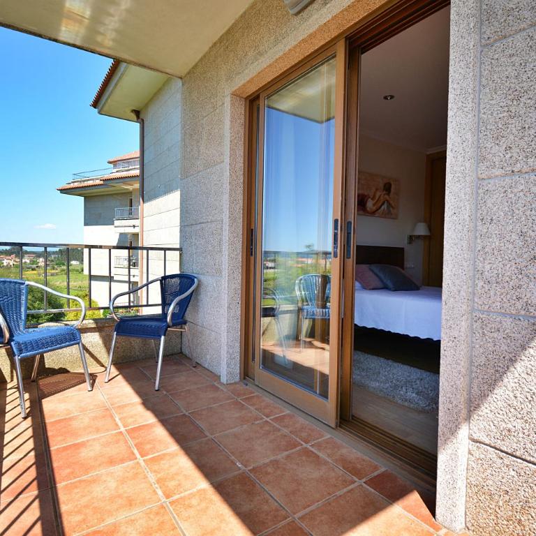 GALIHOST - Piso con terraza a un paso de Playa de A Lanzada - Apartamento de 3 dormitorios - 6