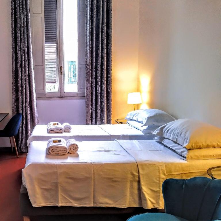 NIK Suite - Camera Matrimoniale/Doppia con Letti Singoli con Bagno Privato Esterno - 2