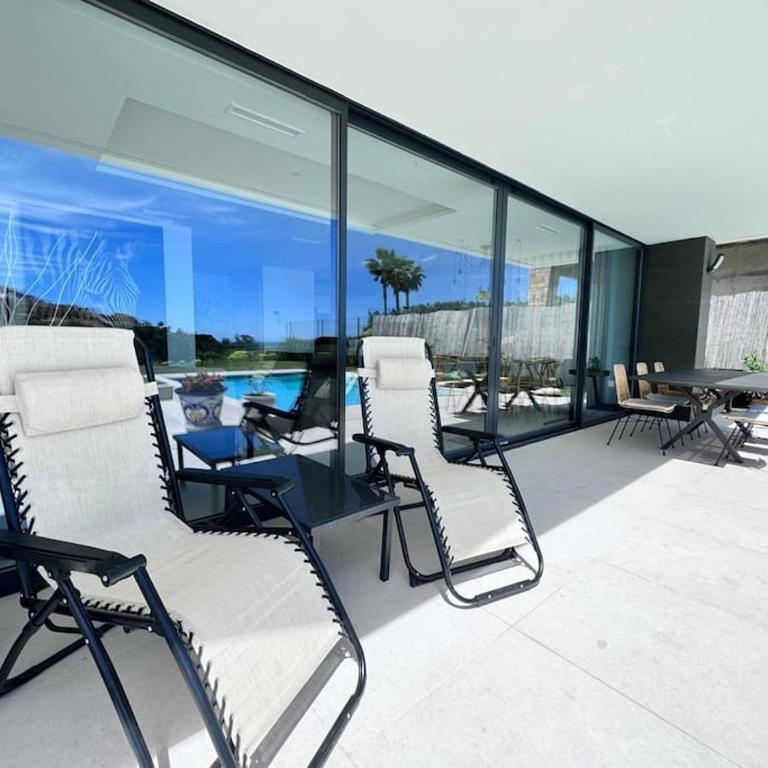 Luxueuze villa met verwarmd zwembad en zeezicht - Villa - 7