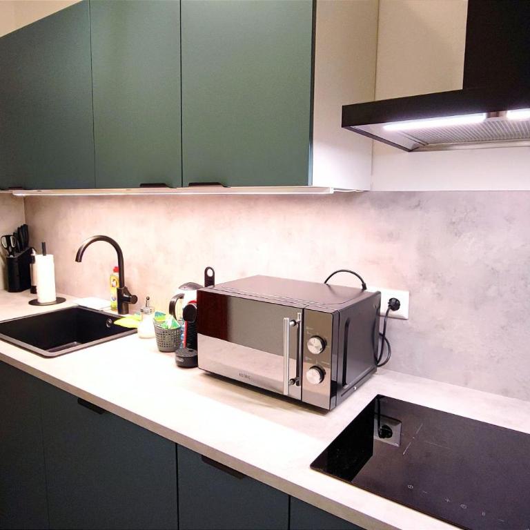 HOMELY STAY Serenity Greens - Stylisch Studio-Apartment with kitchen - 15 min from Central Station-pet friendly - Apartamento - 5