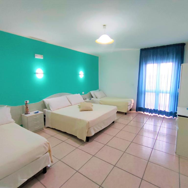 Hotel Baia del Cigno - Camera Quadrupla Comfort - 1
