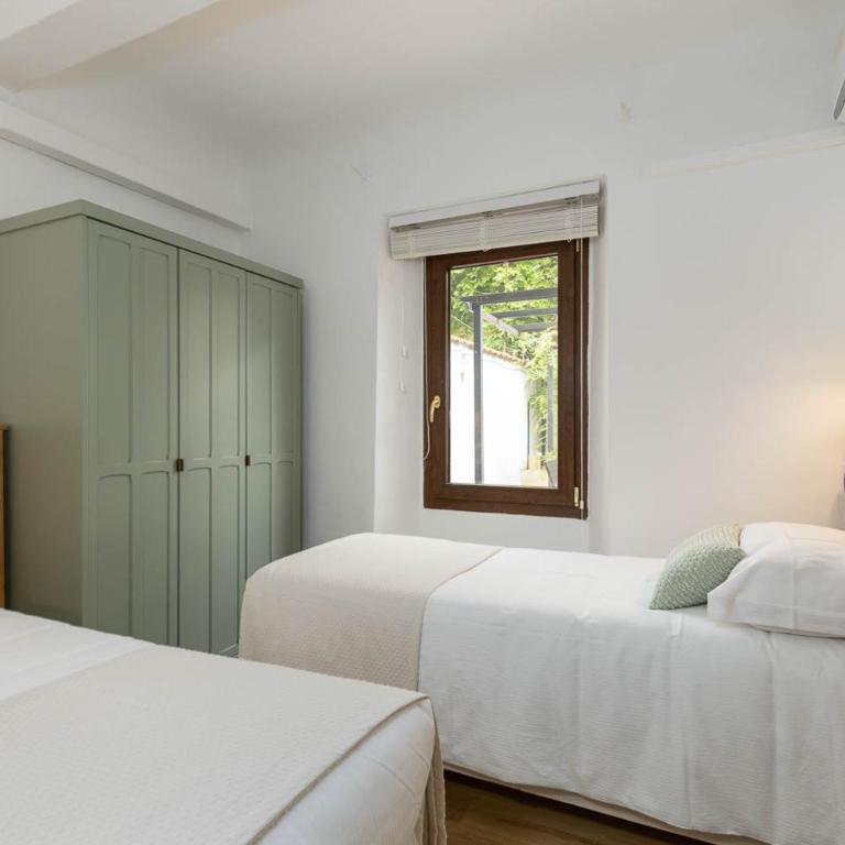 Casa Il Patio - Appartamento Deluxe con 2 Camere da Letto e Vista Giardino - 9