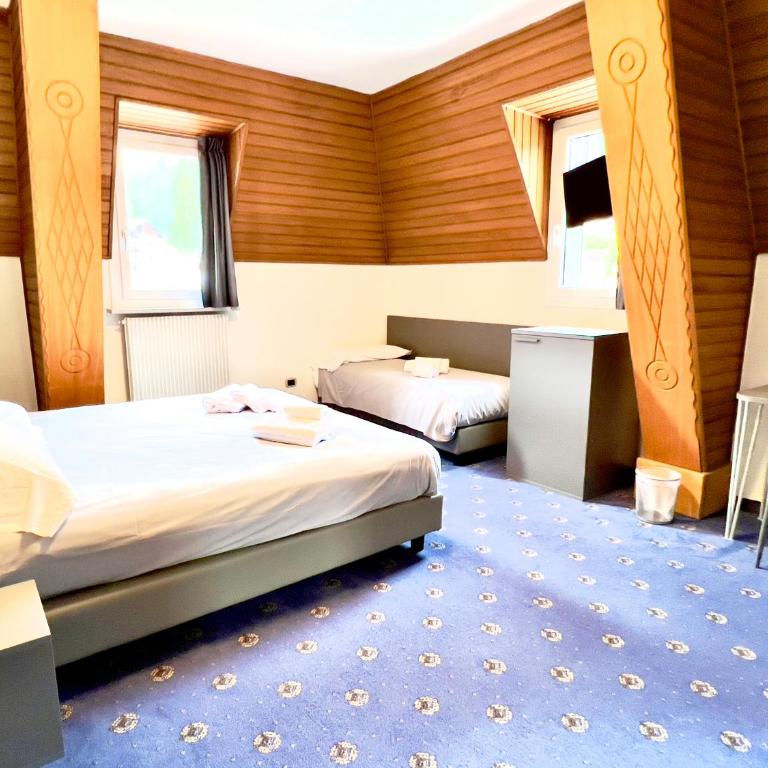 Hotel Regina del Bosco - Superior Dreibettzimmer - 1