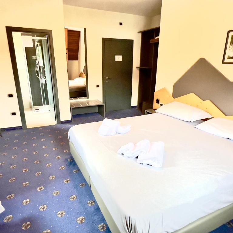 Hotel Regina del Bosco - Superior Dreibettzimmer - 3