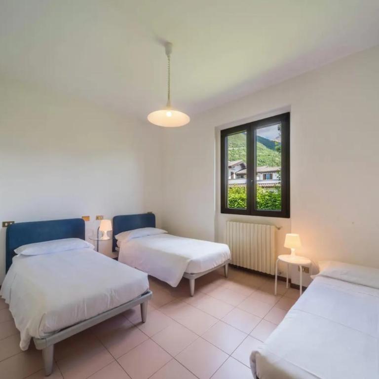 Villa Rita - Appartamento con 3 Camere da Letto e Vista Lago - 12