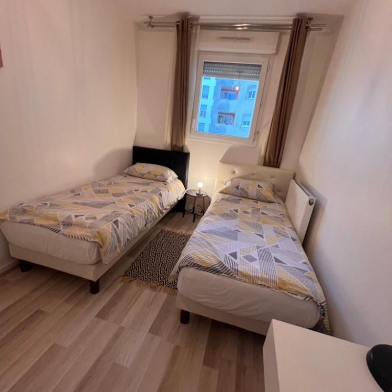 Appt à 10 min de Paris, 15 min a pied du SDF - Apartamento de 3 dormitorios - 10