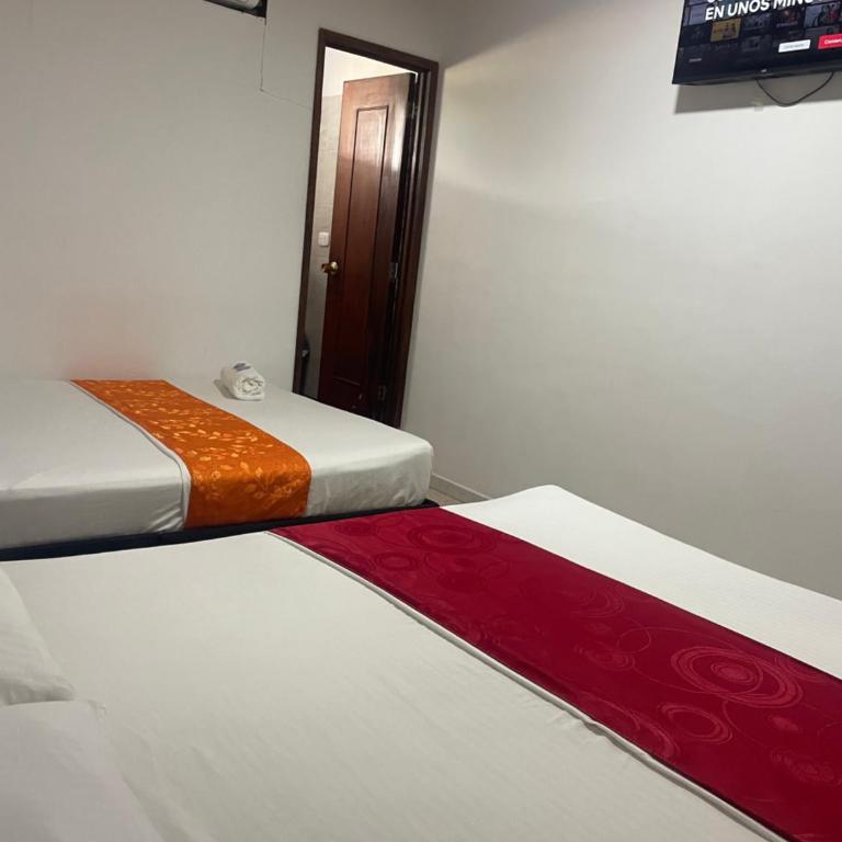 Hotel Descanso Inn Villavicencio - Habitación Deluxe con 2 camas grandes - 5
