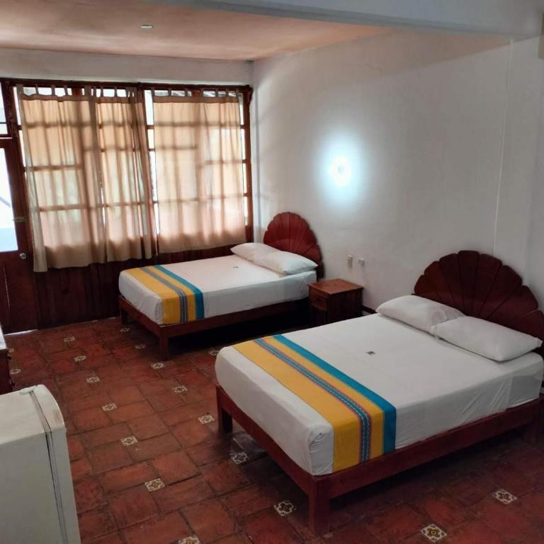Hotel y Bungalows Acuario - Habitación Cuádruple Superior - 11