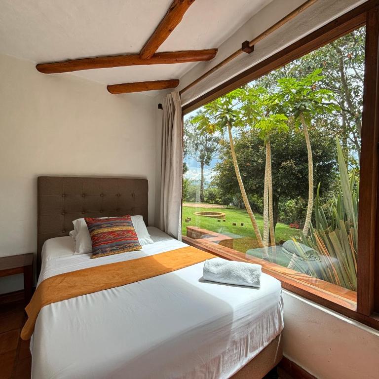 ApartaHotel La Leyenda - Two-Bedroom Apartment with Garden View - 4