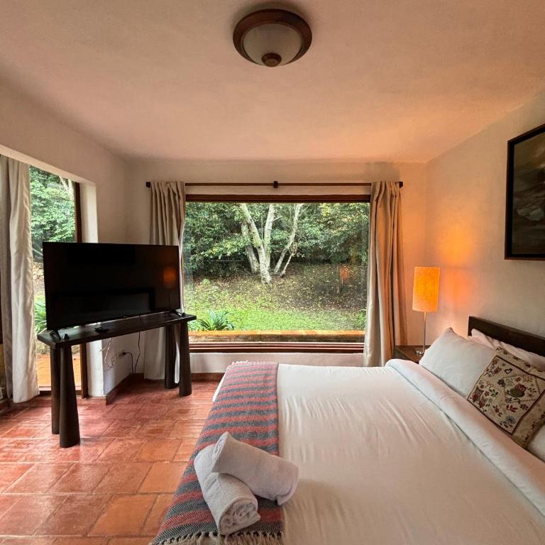 ApartaHotel La Leyenda - Two-Bedroom Apartment with Garden View - 10