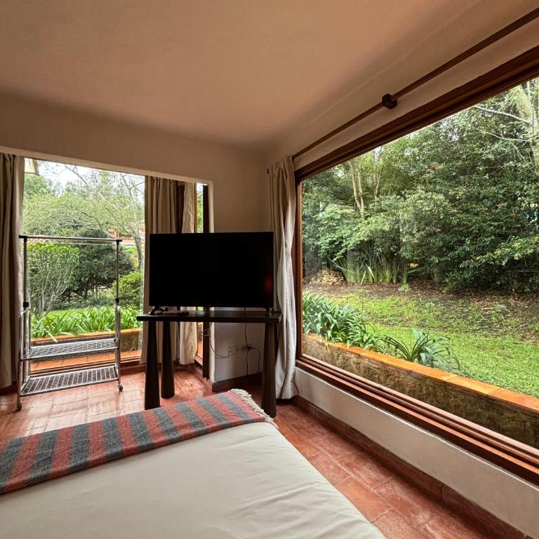 ApartaHotel La Leyenda - Two-Bedroom Apartment with Garden View - 11