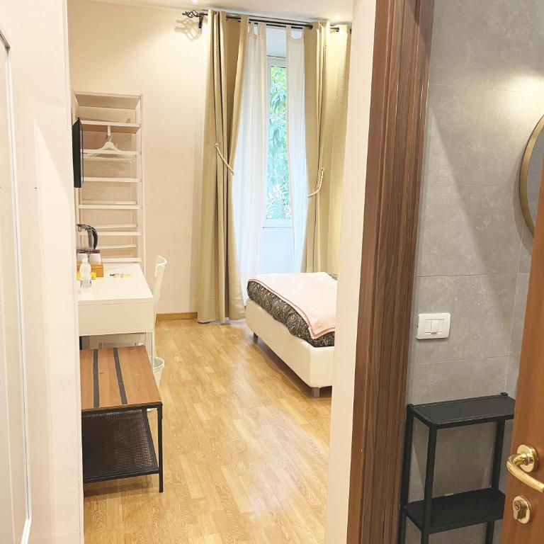 Monti49 GuestHouse - Camera Tripla Comfort - 4