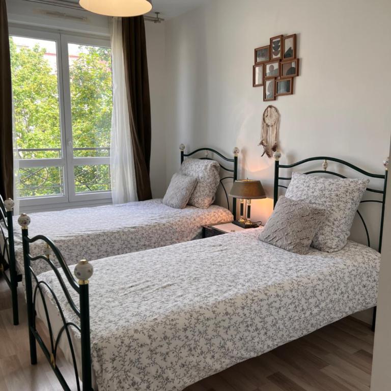 Appt à 10 min de Paris, 15 min a pied du SDF - Apartamento de 3 dormitorios - 5