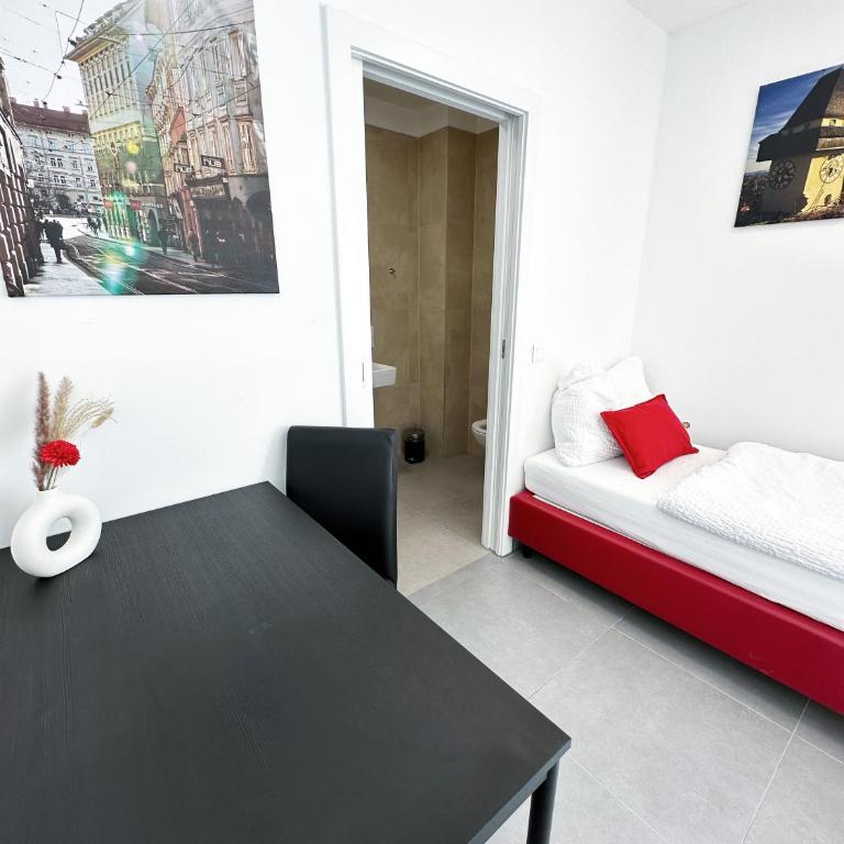 Grazora Living Apartments - Zweibettzimmer mit Terrasse - 11