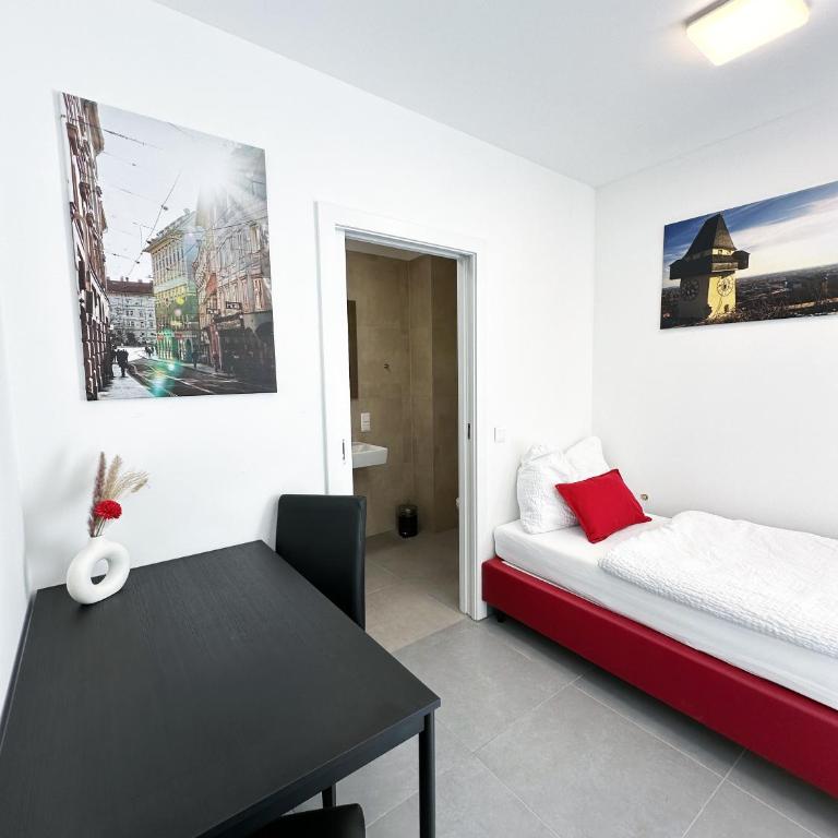 Grazora Living Apartments - Zweibettzimmer mit Terrasse - 1