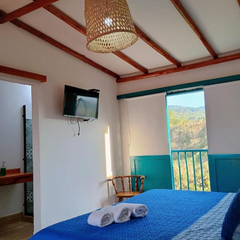 Hotel Casa Del Viento Zapatoca - Suite con cama extragrande - 1