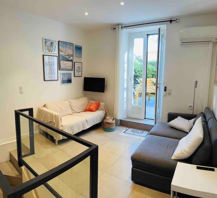 BEAU REZ DE JARDIN- Cannes Suquet - Clim- Calme - Lumineux- 15 minutes Palais des Festival - Apartment mit 2 Schlafzimmern - 13