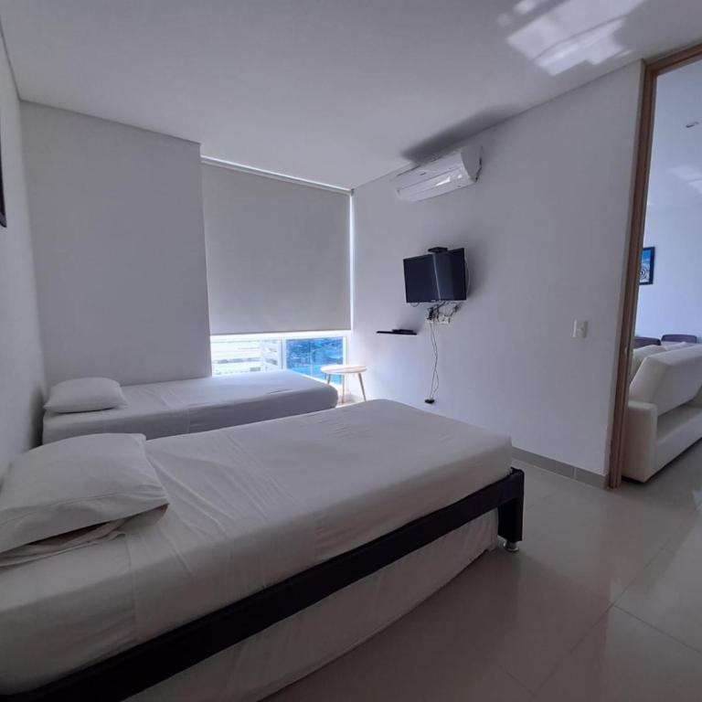 Hermoso y lujoso piso 14 con Salida Directa a la playa y clubhouse increible - Apartamento de 2 dormitorios - 23