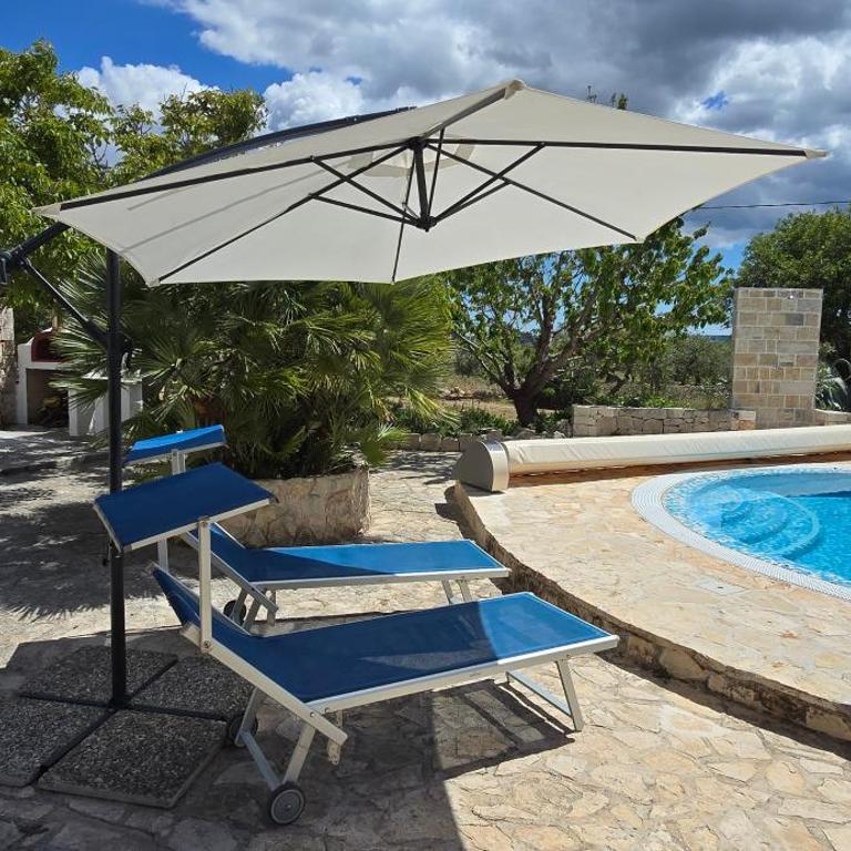 Trullo Olivia con piscina riscaldata, natura e relax - Three-Bedroom House - 20