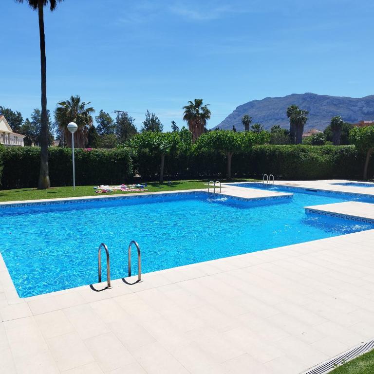 Apartamento familiar con piscina y pádel - Apartamento de 2 dormitorios - 1