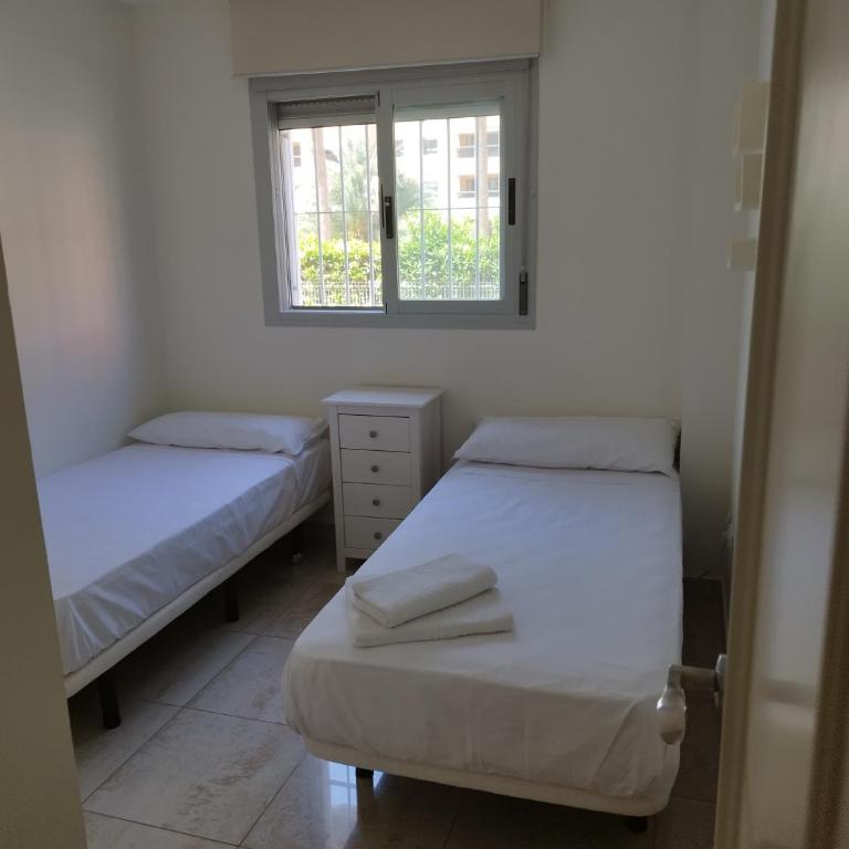 Apartamento familiar con piscina y pádel - Apartamento de 2 dormitorios - 9
