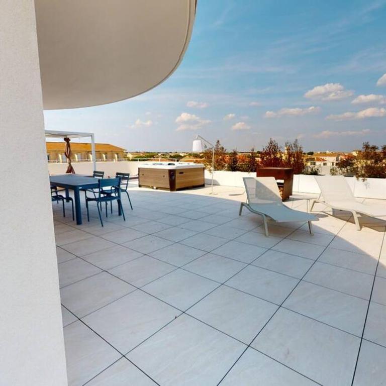 Spendide appartement tout confort, Résidence Archipel T4 en bord de plage, avec grande terrasse aménagée,spa et parking privé - Three-Bedroom Apartment with Sea View - 16