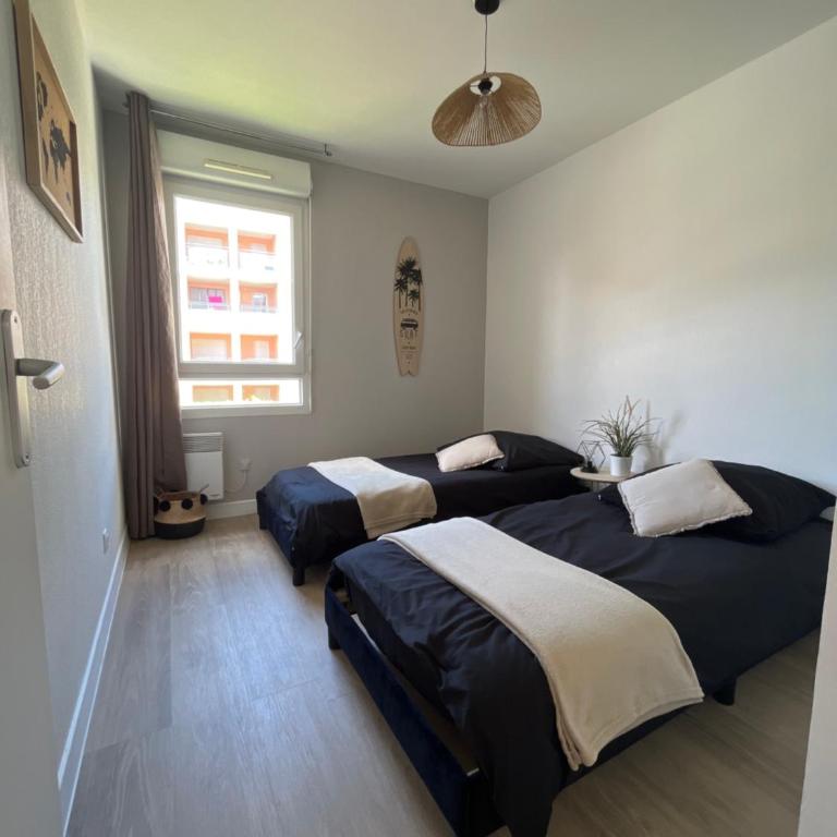 Appartement 2 chambres dans résidence avec piscine et parking - Two-Bedroom Apartment - 10