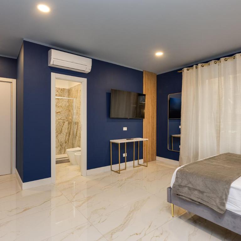 NAIF Suites - Camera Queen Superior - 7