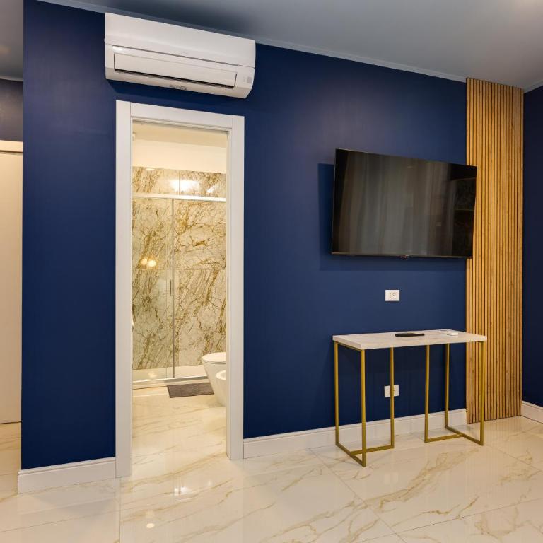 NAIF Suites - Camera Queen Superior - 8