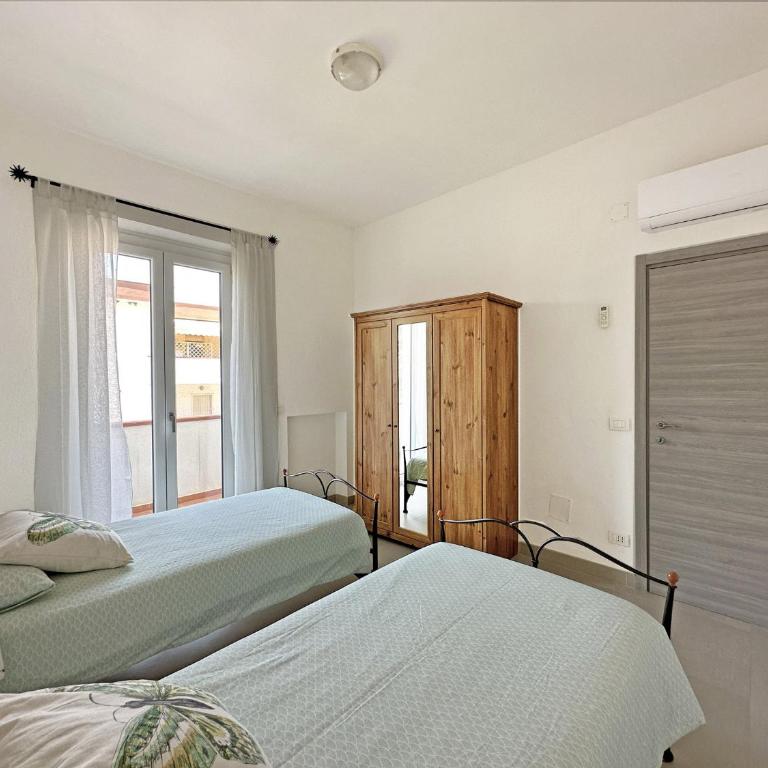 611 - Appartamento trilocale a Marcelli, ristrutturato, climatizzato e con posto auto interno - SPIAGGIA AL WHITE BEACH CLUB INCLUSA - Appartamento con 2 Camere da Letto - 11