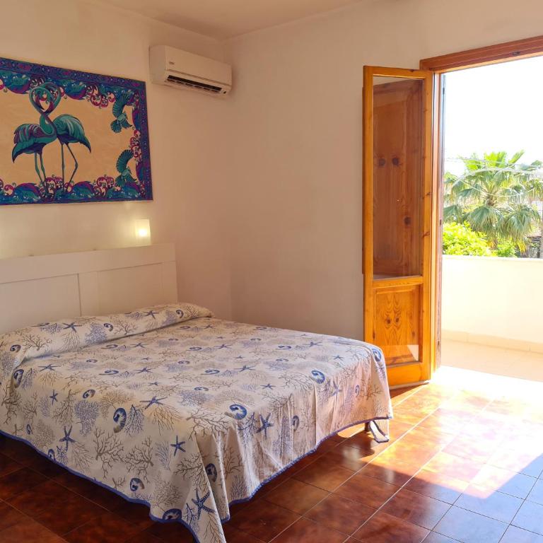 Residenza Orchidea in baia verde - Three-Bedroom Apartment - 1
