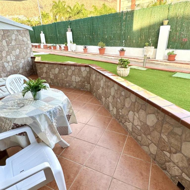 Sur y Sol Junto al Mar by Deihu Experiences - Apartamento Deluxe de 1 dormitorio con vistas al jardín - 8