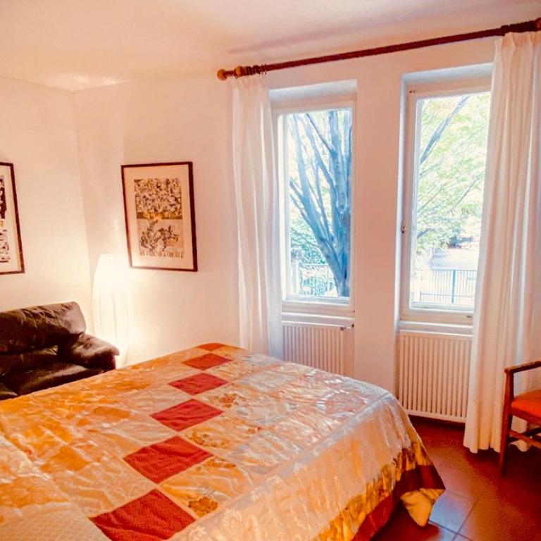 Le Residenze dei Serravallo - Appartamento con 2 Camere da Letto, Terrazza e Vista Giardino - 13