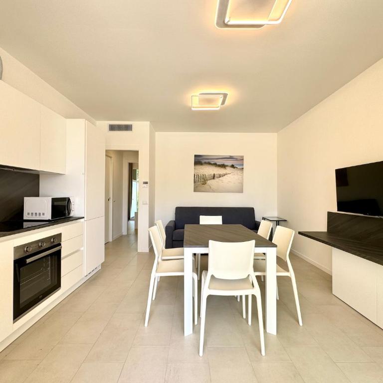 Residence Wave Island - Carraro Immobiliare - Family Apartments - Appartamento con 2 Camere da Letto e Vista Piscina - 14