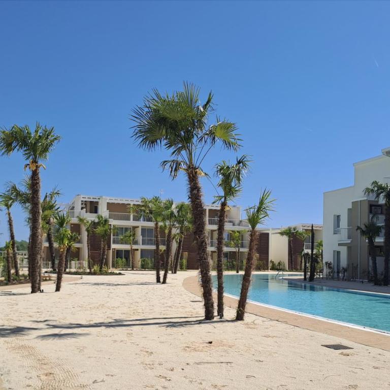 Residence Wave Island - Carraro Immobiliare - Family Apartments - Appartamento con 2 Camere da Letto e Vista Piscina - 30
