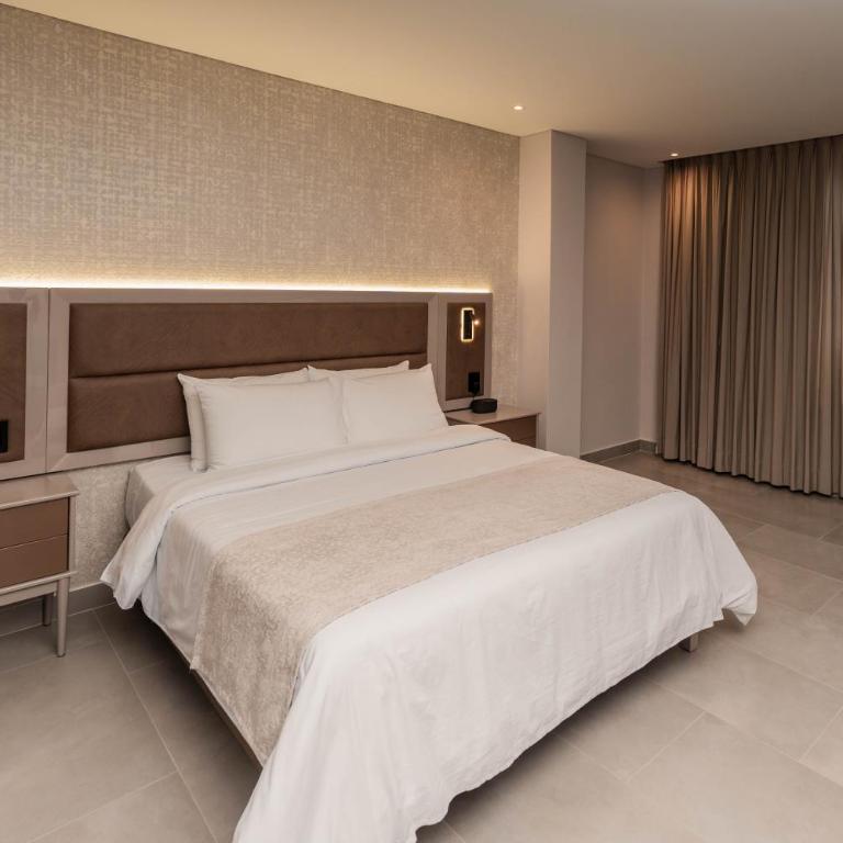 Amari Living Suites - Suite con cama grande - 17