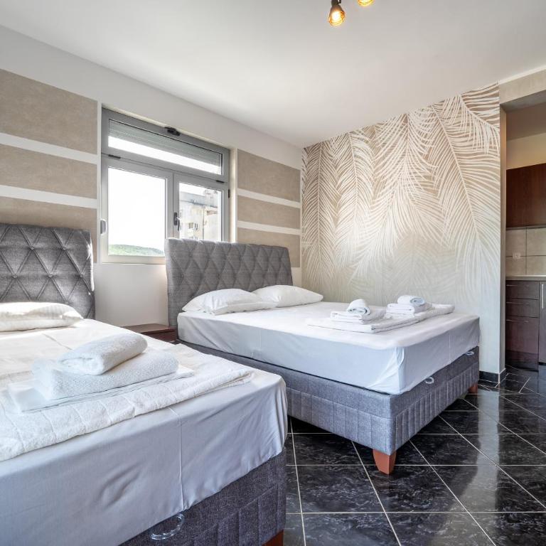 Delfin Apartments - Standardni Trokrevetni Studio - 1