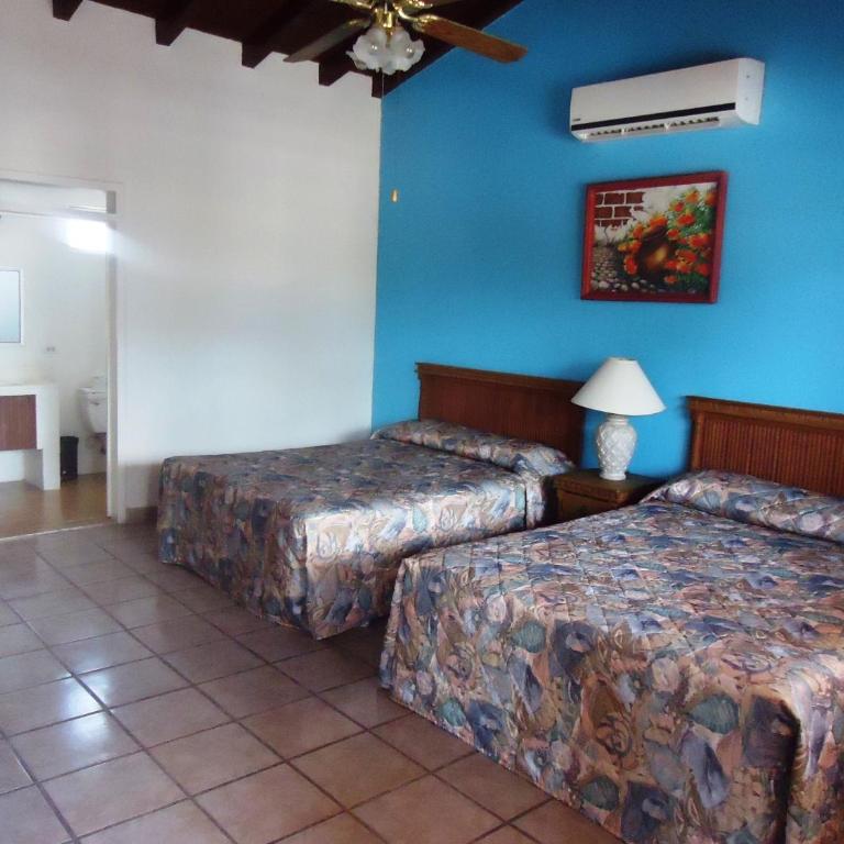 Hotel La Hacienda de la Langosta Roja - Habitación con 2 camas grandes - 9