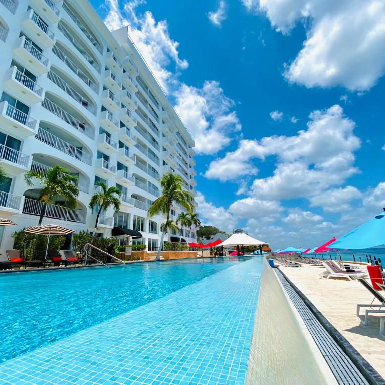 Coral Princess Hotel & Dive Resort - Deluxe Zimmer mit Kingsize-Bett am Meer - 2