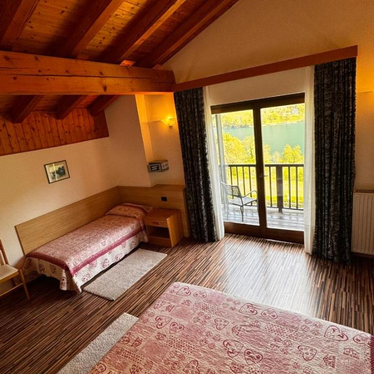 Albergo Stella Alpina - Dreibettzimmer mit Seeblick - 1