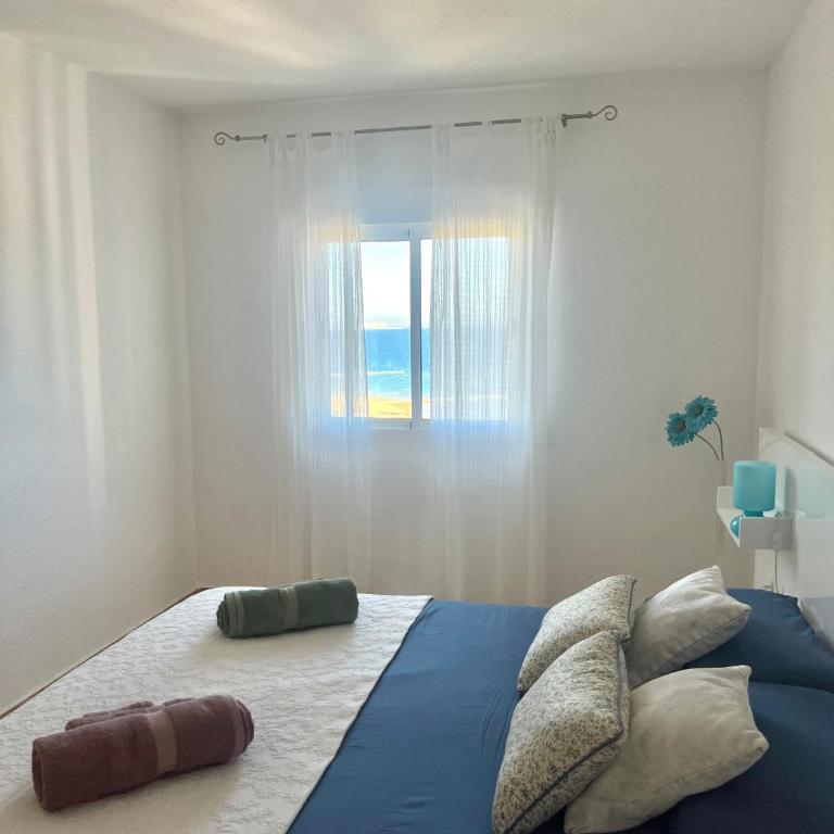 Apartamento en primera línea de la playa a 15 minutos de la Ciudad de Valencia - Three-Bedroom Apartment - 6