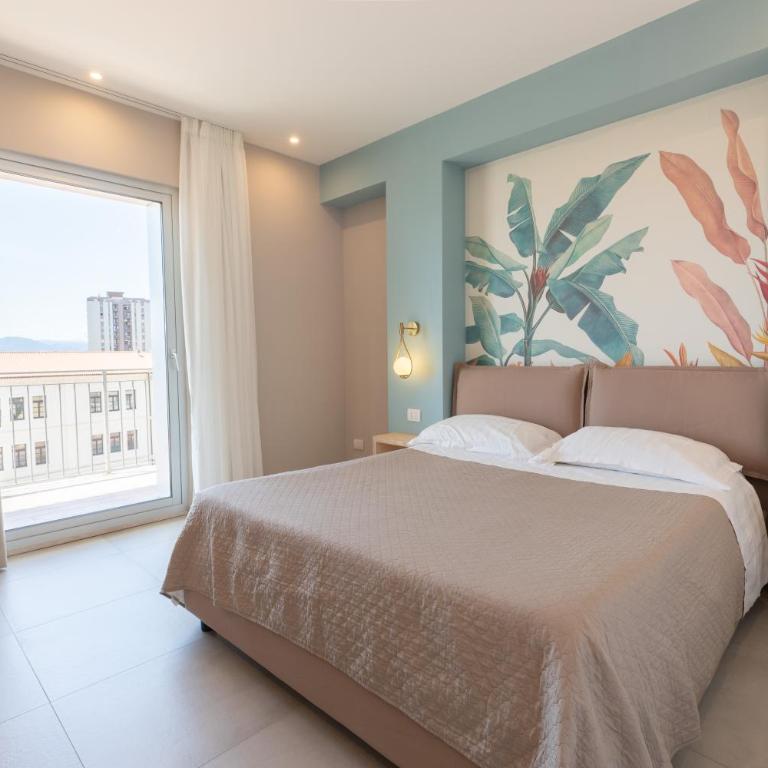 Antares Rooms and Suites - Camera Matrimoniale Deluxe con Balcone e Vista Mare - 1