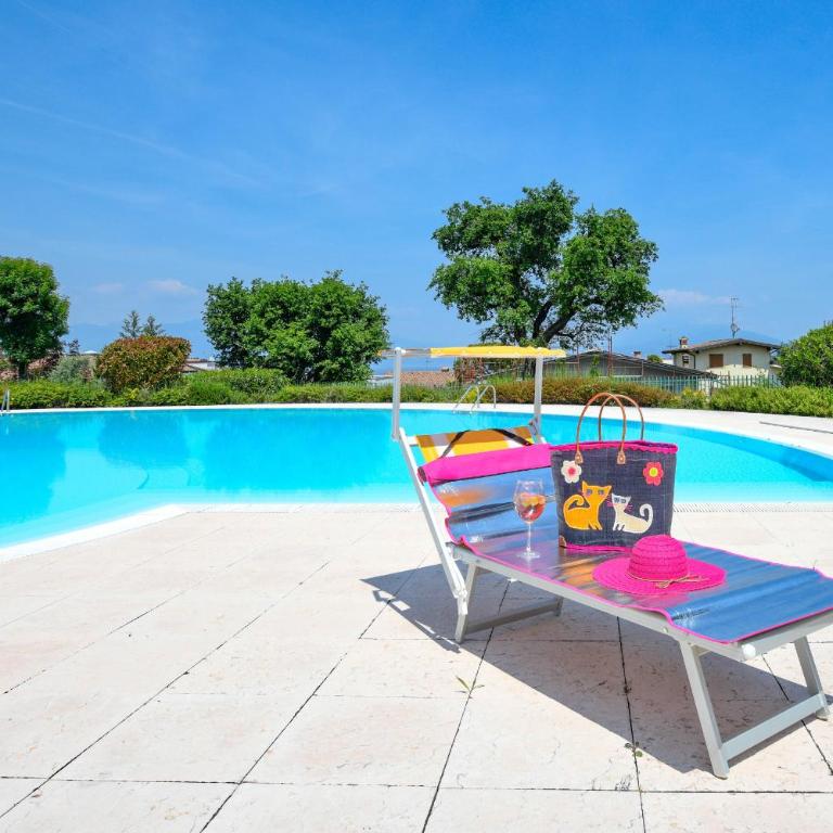 Co2 apartment in Residence Vistalago with 5 pools DesenzanoLoft Official Partner Homes & Villas by Marriott Bonvoy - Appartamento con Vista Piscina - 27