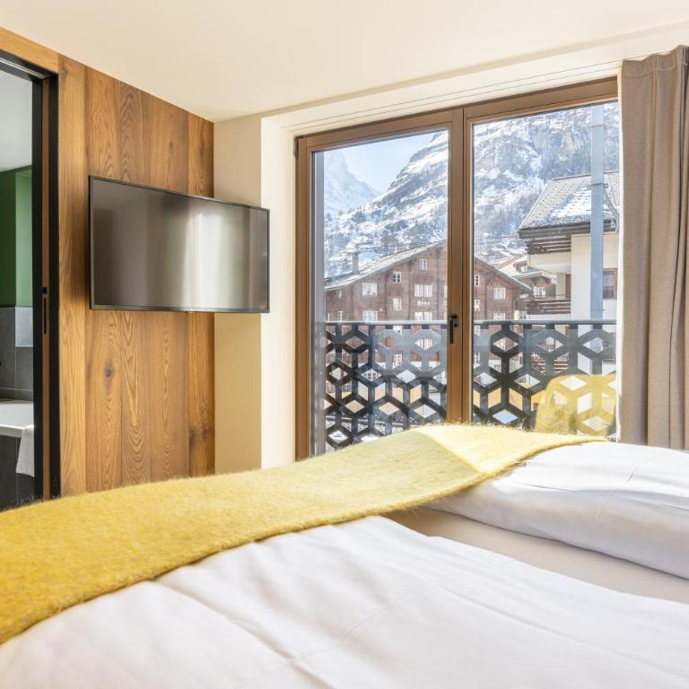 Hotel ZERMAMA Zermatt - Suite mit Balkon und Blick auf das Matterhorn - 6