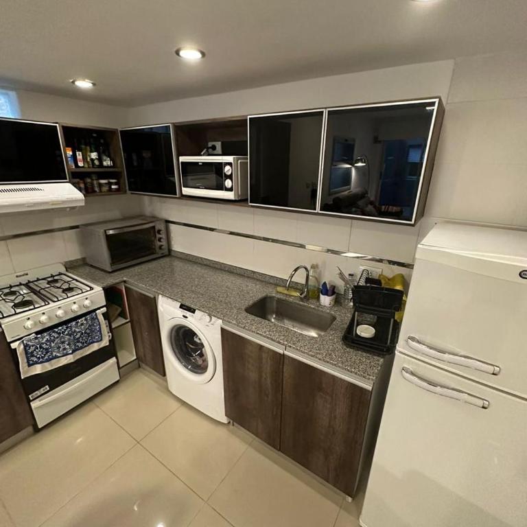 Departamento 2 habitaciones con cochera y cocina - Apartamento de 2 dormitorios - 8