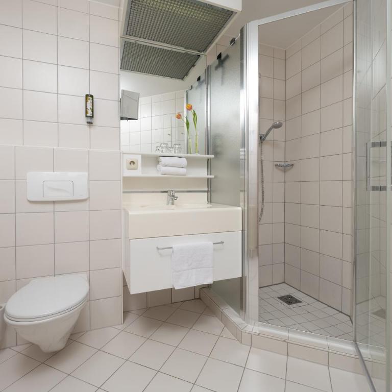 MONDI Appartements am Grundlsee - Doppelzimmer mit Seeblick - 9