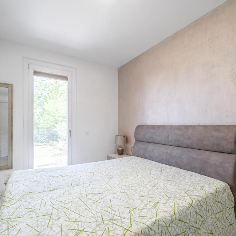 HOST4U - Garda Lake Lido Apartments With Pool, Garden and Private Parking in Garage - Apartment - 10