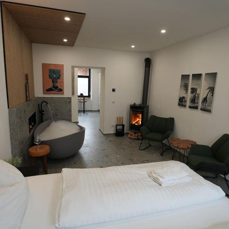 Suite mit Badewanne, Kamin und Parkplatz - Apartment mit 1 Schlafzimmer - 11