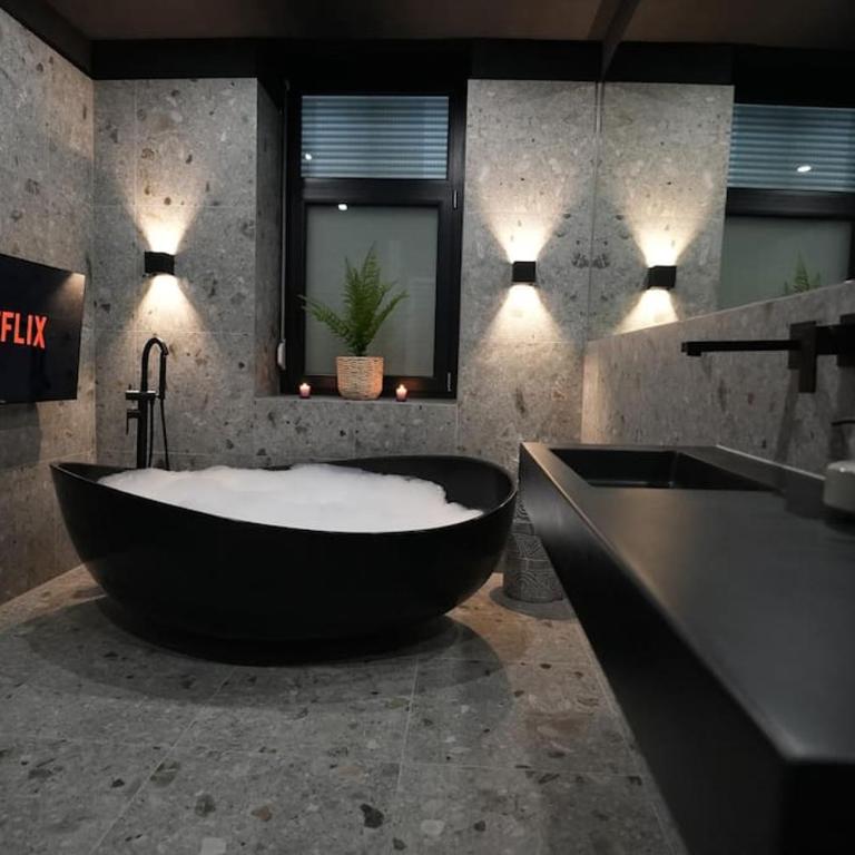 Luxusapartment mit Badewanne und Parkplatz - Apartment mit 1 Schlafzimmer - 1