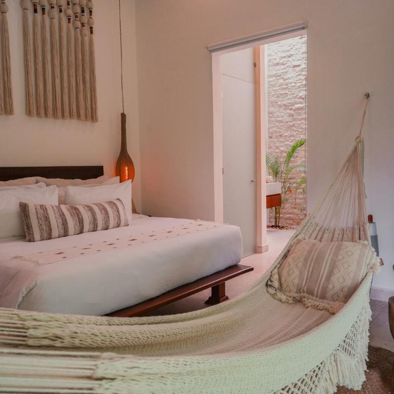 Olbil Hotel Boutique - Habitación Doble Deluxe con bañera - 17
